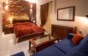 Postel nebo postele na pokoji v ubytování Villa Irene Syros