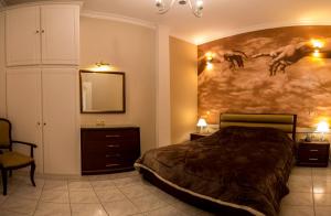 Postel nebo postele na pokoji v ubytování Villa Irene Syros