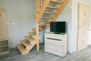 TV a/nebo společenská místnost v ubytování Baltic-Sand