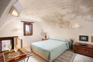 Llit o llits en una habitació de Casa Rodanthi - Luxury Castle Residence