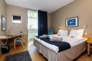 Postel nebo postele na pokoji v ubytování Stiftsgården Åkersberg + 37 fotografií