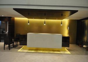Posezení v ubytování Tarawade Clarks Inn Pune