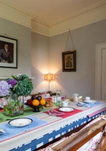 a table with plates of food on top of it at The Old Monastery Guesthouse in Cahersiveen