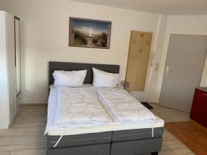 Postel nebo postele na pokoji v ubytování Moderne Apartments im Ferienpark auf Rügen