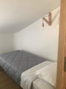 Postel nebo postele na pokoji v ubytování MILOS HOUSE