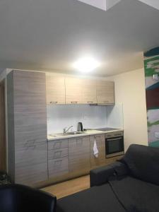 Kuchyň nebo kuchyňský kout v ubytování MILOS HOUSE