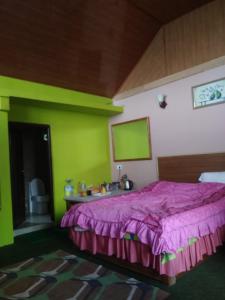 Postel nebo postele na pokoji v ubytování Bethany Homestay