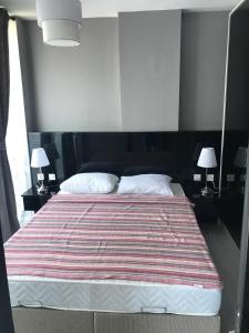 מיטה או מיטות בחדר ב-Super bodrum modern Апартаменты