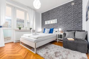 Posteľ alebo postele v izbe v ubytovaní Apartments Madelaine Warsaw by Noclegi Renters