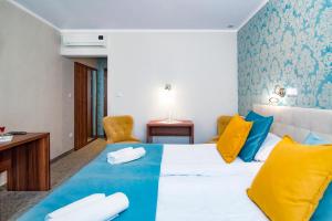 Postel nebo postele na pokoji v ubytování Pod Wzgórzem Bed & Breakfast