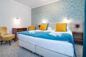 Postel nebo postele na pokoji v ubytování Pod Wzgórzem Bed & Breakfast