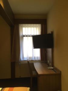 TV a/nebo společenská místnost v ubytování Hotel Hechinger-Hof