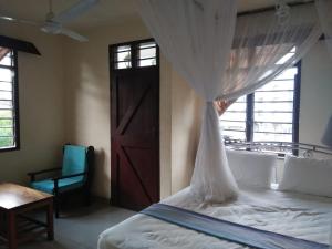Cingaki Hotel客房内的一张或多张床位