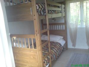 a bunk bed in a room with a bunk bedutenewayewayangering at Grindhammaren B&B in Ramsberg
