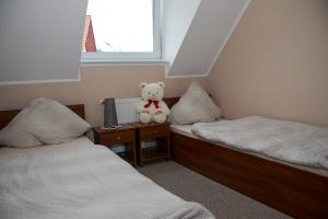 Postel nebo postele na pokoji v ubytování Apartamenty Fala