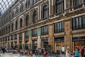 a large building with people sitting outside of it at Hotel Matilde - Lifestyle Hotel in Naples