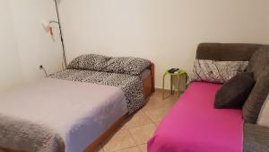 Posteľ alebo postele v izbe v ubytovaní Apartment Gobov