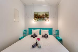 Giường trong phòng chung tại Villa LETA - Luxury villa in a green oasis with heated swimming pool, fitness center and summer kitchen - Kvarner +131 ảnh