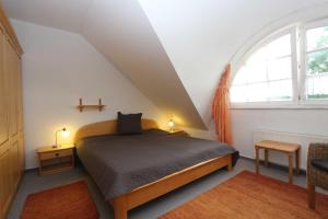 Ένα ή περισσότερα κρεβάτια σε δωμάτιο στο Fewo 11 Schekahn Am Achterwasser Zempin - Fewo cc