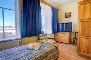 Postel nebo postele na pokoji v ubytování Hotel Luiize