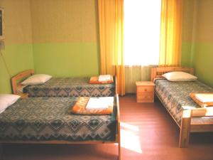 Postel nebo postele na pokoji v ubytování Guesthouse Airava