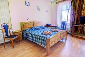 Postel nebo postele na pokoji v ubytování Hotel Luiize