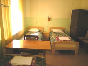 Postel nebo postele na pokoji v ubytování Guesthouse Airava