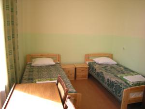 Postel nebo postele na pokoji v ubytování Guesthouse Airava
