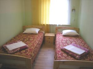 Postel nebo postele na pokoji v ubytování Guesthouse Airava + 28 fotografií