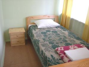 Postel nebo postele na pokoji v ubytování Guesthouse Airava