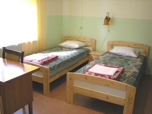 Postel nebo postele na pokoji v ubytování Guesthouse Airava