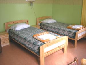 Postel nebo postele na pokoji v ubytování Guesthouse Airava