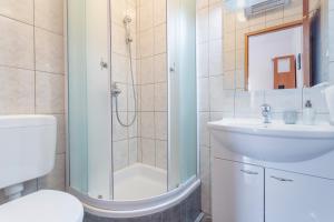 Een badkamer bij Apartments Milka
