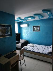 Ліжко або ліжка в номері Apartmani Spasic