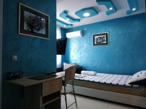 Ліжко або ліжка в номері Apartmani Spasic