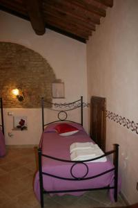 Posteľ alebo postele v izbe v ubytovaní Antico Casolare