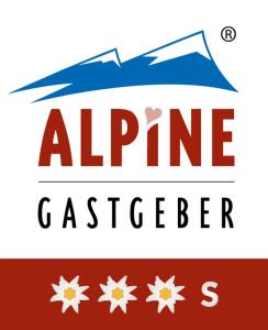 a logo for the alpine casserler company at Gastehaus Reichle in Tannheim