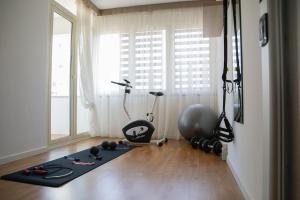 Fitness centrum a/nebo fitness zařízení v ubytování Bay View Apartment