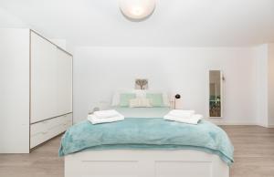Posteľ alebo postele v izbe v ubytovaní Fantásticos Lofts Malagueta