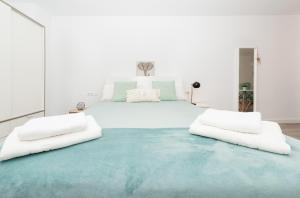 Posteľ alebo postele v izbe v ubytovaní Fantásticos Lofts Malagueta