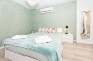 Posteľ alebo postele v izbe v ubytovaní Fantásticos Lofts Malagueta