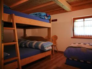 Postel nebo postele na pokoji v ubytování Rifugio Stella Alpina Spiz Piaz per escursionisti