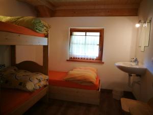 Postel nebo postele na pokoji v ubytování Rifugio Stella Alpina Spiz Piaz per escursionisti