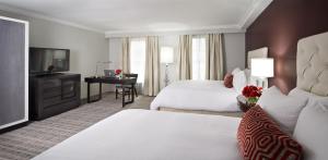 Ein Bett oder Betten in einem Zimmer der Unterkunft The Graham Georgetown