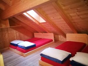 Postel nebo postele na pokoji v ubytování Rifugio Stella Alpina Spiz Piaz per escursionisti
