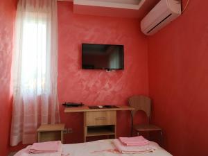 Телевізор і / або розважальний центр в Apartmani Spasic