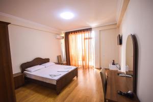 Letto o letti in una camera di Hotel Otsneba
