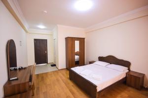 Letto o letti in una camera di Hotel Otsneba