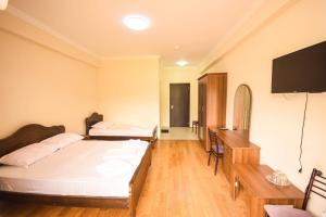 Letto o letti in una camera di Hotel Otsneba