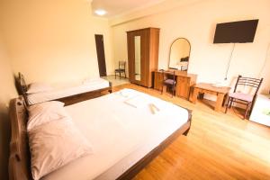Letto o letti in una camera di Hotel Otsneba